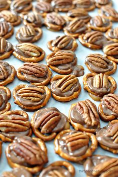 there are many pecans on the cookie sheet