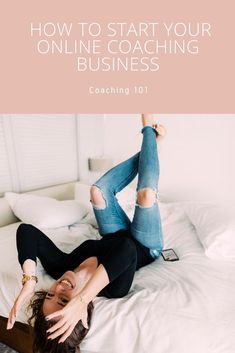 a woman laying on top of a bed with her arms in the air and text overlaying how to start your online coaching business