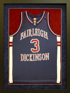 Custom Framed Fairleigh Dickinson Basketball Jersey. No matter the memento, artwork, or memorabilia, we can design the perfect way to display it! Get yours framed at My Framing Store, Inc. in Edison, NJ. www.MyFramingStore.com 485 US Highway 1, Edison NJ 08817 (732) 777-0887 In Frame, College Basketball