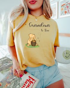 Grandma to Bee T-Shirt, Winnie the Pooh Shirt, In My Disneyland Mama Shirt, Pooh Bear Shirt, Mother Day Gift For Mom, Disneyland Mama Shirt ⚡How to Order, -Swipe to all of the pictures -Select Size and Color of the Product from drop down menus -Select Quantity -Add your chart and place order -For every single shirt you have to repeat every step ⚡Material Info -Ultra Soft -Sideseamed -Retail fit -Unisex Sizing -Shoulder taping ⚡Processing Time info -Standart process time 1-3 days, for the rush op Pooh Shirt, Winnie The Pooh Shirt, Bee T Shirt, Single Shirt, Mother Day Gift, Bear Shirt, Pooh Bear, Mama Shirt, Etsy Shipping