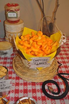 a table topped with baskets filled with food