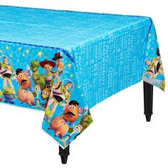 a blue table cloth with cartoon characters on it and an image of the character from toy story