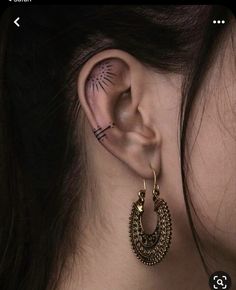 a woman with ear piercings on her ears