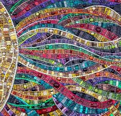 an abstract mosaic design with many colors and shapes on it's surface, including the eye