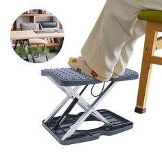 a person standing on top of a chair next to a desk