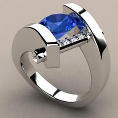 a ring with a blue stone in the middle