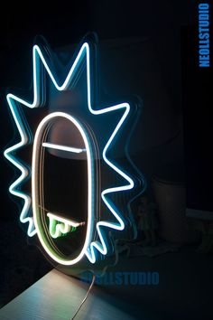 an illuminated mirror is shown in the dark, with light coming from it's reflection