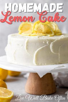 a cake with lemons on top and the words homemade lemon cake above it