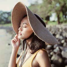 Introducing the hat for your every adventure as the season gets warmer. Braided meticulously by artisans in Gianyar, Bali from natural Jute material, this sweet hat offers both comfort and elegance. Designed with ideal thickness and weight that allow its brim to be easily folded, stretched, and styled, making it easy to take to any holiday trips. There are just so many things to love about Lola, try it and you'll add a new one to the list! • Brim diameter: 21 inches approximately• Crown height: Sustainable Outfits, Eco Friendly Accessories, Made Accessories, Linen Ribbon, Beach Boutique, Clothing Summer, The Paradise, Jute Bags, Women's Hats