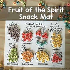 the fruit of the spirit snack mat is displayed on a table with cereals and pretzels