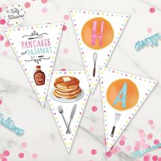 three bunting flags with pancakes on them