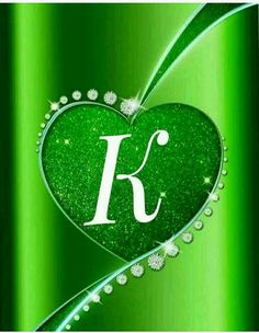 a green heart with the letter f on it