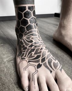 a person with a tattoo on their foot