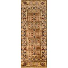 an antique persian rug with geometric design on the bottom and gold, blue, yellow and red colors