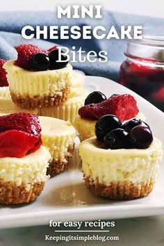 mini cheesecake bites on a plate with berries