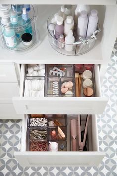 an organized drawer in a bathroom