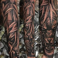 a man's arm with tattoos on it and an image of a tiger in the background