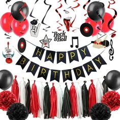 a birthday party with black and red decorations