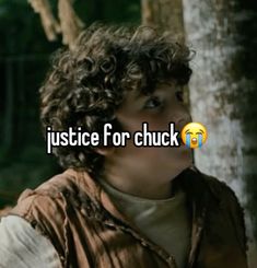 a young boy with curly hair standing in front of a tree and text that reads justice for chuck