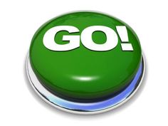 a green button with the word go on it and white letters in front of it