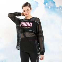 Style: 578562-01 Color: Puma Black Gender: Womens * Relaxed Fit * All-Over Mesh Long Sleeve Construction * Jersey Binding At Collar, Cuffs, And Scoop Bottom Hem * Tonal Stripe Inserts At 3/4 Sleeves * Solid Fabric Overlay Across Front Chest And Back * Contrast Neon Piping Details Around Front Panel And Cuffs * Glitter Puma Tpu Logo Patch With Sophia Webster High Density Print On Front * Inserts: 100% Cotton * Shell: 91% Polyester, 9% Elastane Casual Mesh Sports Top, Sporty Puma Logo Tops For Streetwear, Sporty Puma Tops For Sports, Sporty Puma Logo Tops For Sports, Black Sporty Top With Puma Logo, Sporty Black Top With Puma Logo, Sporty Crew Neck Top With Puma Logo, Sporty Puma Logo Crew Neck Top, Sports Crew Neck Top With Puma Logo