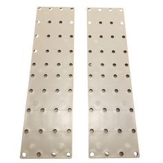 two metal plates with holes on them