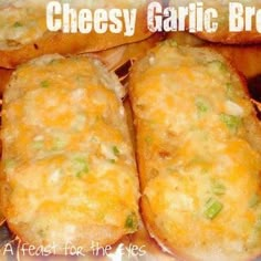 four cheesy garlic breads in a basket with the words cheese garlic bread