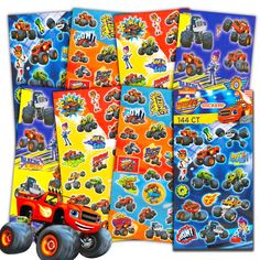 monster trucks stickers are on display in front of a white background with orange and blue colors