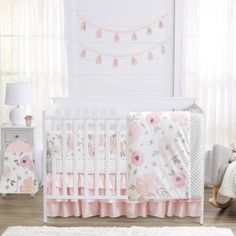 The 6 piece Pink and Gray Watercolor Floral baby bedding collection by Sweet Jojo Designs will create an elegant and sophisticated look for your nursery. This artistic girl crib bedding set uses a sensational collection of exclusive brushed microfiber fabrics. It boasts a hand painted watercolor floral print, a mini gray polka dot, and solid blush pink fabrics. The gorgeous color palette of gray, white, and delicate shades of pinks will set your nursery up in high style. This crib bedding set in Floral Baby Bedding, Floral Crib Bedding, Crib Liners, Baby Crib Bedding Sets