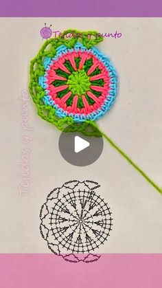 a crocheted flower is shown on the screen