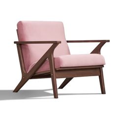 a pink chair sitting on top of a white floor next to a wooden armrest