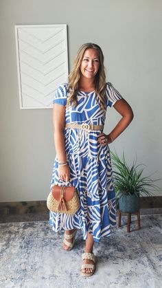 This Blue Boho Tiered Maxi Dress is perfect for a happy and simple summer look. The light weight material will keep you comfortable while the flowy tiered design adds a touch of feminine chic. Plus, it has pockets for added convenience! The Fit of This Boutique Maxi Dress: See HOW TO MEASURE Here. TOP: Flat Across Measurements in Inches Size: Chest Across Waist Across Length Small 17 25 45 Medium 18 26 45 Large 19 27 46 X-Large 21 29 47 2XL Flowy Summer Tiered Dress For Day Out, Flowy Tiered Summer Dress For Day Out, Flowy Tiered Dress For A Summer Day Out, Casual Tiered Dress For Beach, Casual Tiered Sundress, Casual Tiered Ruffle Dress For Beach, Casual Summer Tiered Maxi Dress, Casual Tiered Maxi Dress For Day Out, Flowy Casual Tiered Dress For The Beach