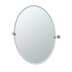 an oval mirror with two balls on the edge and one ball at the bottom, is shown