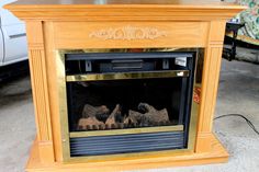 a fire place sitting in the middle of a room