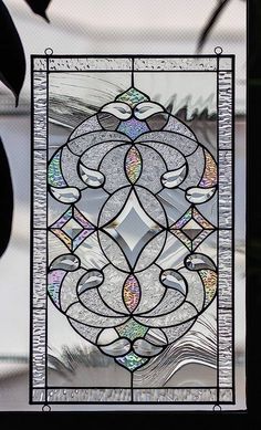 a stained glass window with an abstract design