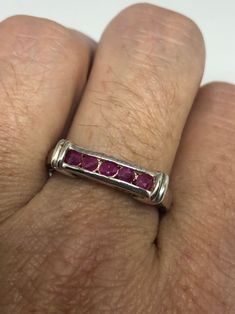 Unusual Deep Toned Ruby Sterling Filigree Setting Handmade size 9 Can be resized. My jeweler charges $10-$20 My jeweler charges a $10-$20 fee All rings are shipped free in the US in a nice gift box. Check out our over a THOUSAND great reviews Engraving is $4 per letter and is not always perfect depending on the piece. It can take a few days if the jeweler is busy. This is payable to Paypal Judithsltd@gmail.com Unique Ruby Ring Stamped 925 For Anniversary, Diamond Skull, Wide Wedding Bands, Gothic Ring, Pink Ruby, Celtic Rings, Gothic Rings, Wide Band Rings, Band Engagement Ring