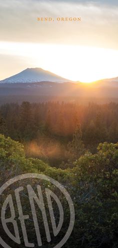 the sun is setting over some trees and hills in the distance, with an inscription that reads bend, oregon