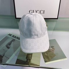 SHOP MORE LUXURY PRODUCTS HERE Description Gucci GG Canvas Baseball Cap White WhiteWhite Cotton Canvas Includes box, dust bag.This product is of the premium quality. Designer White Visor Baseball Cap, Luxury White Baseball Cap, Dior Shirt, Gucci Shirt, Louis Vuitton Shirt, Chanel Shirt, Cap White, Gucci Gg Marmont, Reversible Belt