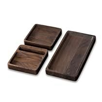 three wooden trays sitting on top of each other