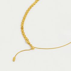 Your chain game is about to get elevated. This string of tiny discs—featuring our signature brushed-gold finish—offers a new neutral with tons of styling options.
Metal: DD Signature Brushed Gold Plated Over High-Quality Brass.
Length: 13"- 18" (adjustable) Gold Minimalist Coin Necklace With Adjustable Chain, Modern Adjustable Yellow Gold Chain Necklace, Modern Adjustable Delicate Chain Necklace, Earring Sale, Cuff Bangles, Rings Statement, Ring Necklace, Chain Bracelet, Gold Finish