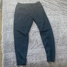 Size: Large Almost Brand New Casual Stretch Bottoms By Under Armour, Casual Under Armour Pants, Under Armour Casual Streetwear Pants, Black Casual Under Armour Sweatpants, Under Armour Casual Jogging Bottoms, Under Armour Streetwear Bottoms With Pockets, Under Armour Bottoms With Pockets, Under Armour Stretch Casual Pants, Under Armour Bottoms With Pockets For Streetwear