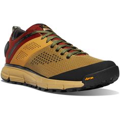 the men's hiker shoe in tan and black with red, yellow and green accents