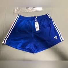 Size Large Adidas Originals Fb Nations Shorts. New With Tags Blue Sporty Athletic Shorts With Three Stripes, Blue Striped Sporty Athletic Shorts, Summer Athletic Shorts With Three Stripes, Blue Sports Shorts With Three Stripes, Blue Athleisure Bottoms With Three Stripes, Casual Blue Athletic Shorts With Short Leg, Casual Blue Athletic Shorts, Streetwear Bottoms With Three Stripes, Short Bottoms With Three Stripes For Spring