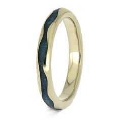 This wavy 14k white gold ring is inlaid with crushed turquoise for a fluid and organic aesthetic. The polished finish is accented by the sparkling fragments of turquoise. The unique elements in this natural wedding band are sure to turn heads! Share your passion for nature with this handmade ring. RING LAYOUTRing Width: 3 mmRing Sleeve: 14k White GoldRing Profile: WavyRing Finish: Polished 0.5 mm 14k White Gold2 mm Crushed Kingman Turquoise0.5 mm 14k White Gold Nature Wedding Band, Organic Aesthetic, Inlay Jewelry, Natural Wedding, Yellow Gold Jewelry, 14k White Gold Ring, 14k Gold Ring, Nature Wedding, White Gold Ring