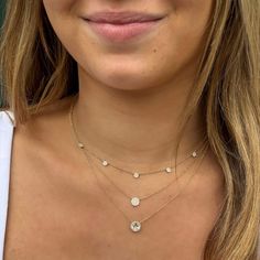 You simply can’t go wrong with a classic diamond necklace and this one takes it to the new level with a captivating round white topaz stone surrounded by dazzling dainty diamonds, this halo solitaire necklace is oh so chic. Details: • 1.47 Total Carat Weight White Topaz • .08 Total Diamond Carat Weight • 24 Pave' Set Round Diamonds • 14k Yellow Gold • Chain Length: Adjustable from 16 inches to 18 inches • Pendant: 8mm • Center Stone Size: 6mm Everyday Gold Necklace, Round Diamond Necklace, Solitaire Necklace, Diamond Solitaire Necklace, Gold Disc, Classic Necklace, Solitaire Necklaces, Station Necklace, Disc Necklace