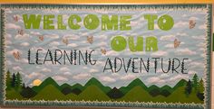 a bulletin board with the words welcome to our learning adventure