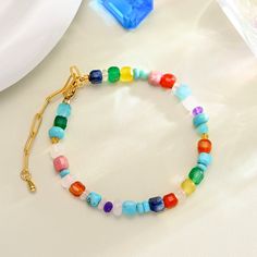 Add a pop of color to any outfit with our Colorful Seed Bead Bracelet. The vibrant pastel colors are refreshing and perfect for summer. Wear it to a party, beach, or music festival and and you'll be cheered up. This adorable bracelet is sure to make you stand out while receiving others' compliments. Find your perfect shade of color and embrace the calming energy of summer! DETAILS Plating: 18K Gold Materials: 18K Gold on Brass, Natural Stones Measurements: Length: 6.69"(17cm) + Extender: 1.57"(4 Turquoise Friendship Bracelets With Colorful Beads For Summer, Multicolor Beaded Bracelets For Spring Vacation, Playful Multicolor Beaded Bracelets For Summer, Summer Turquoise Friendship Bracelets With Colorful Beads, Trendy Turquoise Beaded Bracelets For Summer, Spring Beach Bracelet With Colorful Beads, Casual Multicolor Beaded Bracelets For Summer, Multicolor Beaded Bracelets For Summer, Casual Colorful Beaded Bracelets For Summer