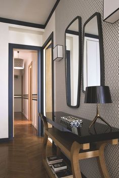 an image of a hallway with mirrors on the wall