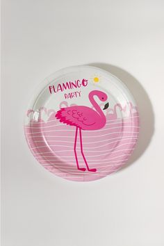 a pink flamingo party paper plate on a white background