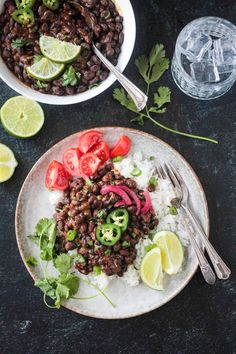 black beans and rice with limes on the side